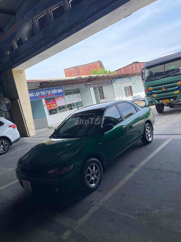 Mazda 323 2000 - ảnh 2