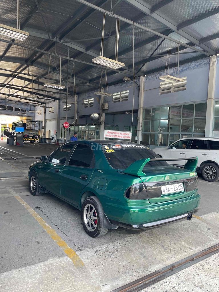 Mazda 323 2000 - ảnh 1