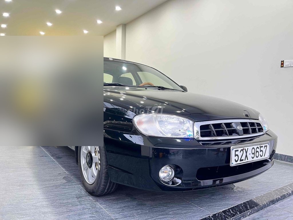 Kia Spectra 2004 - ảnh 1