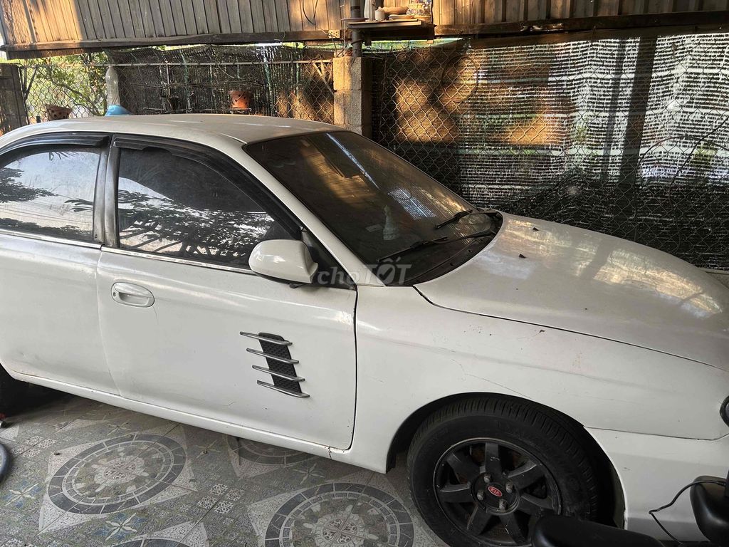 Kia Spectra - ảnh 1
