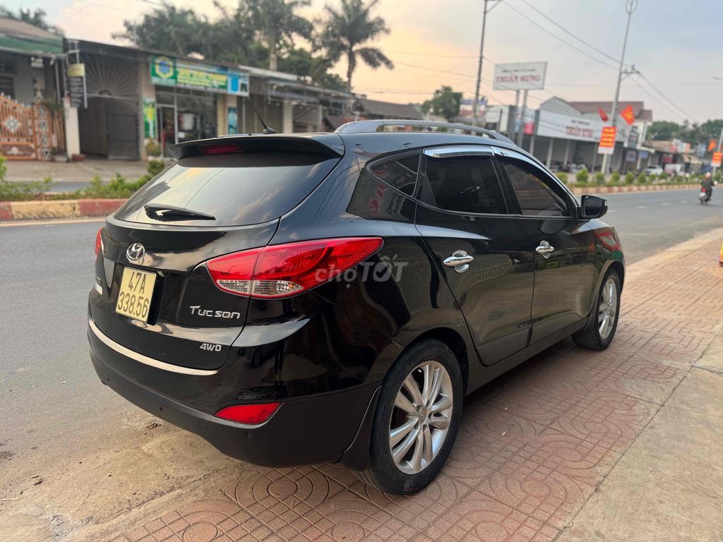 Hyundai Tucson 2011 - ảnh 2