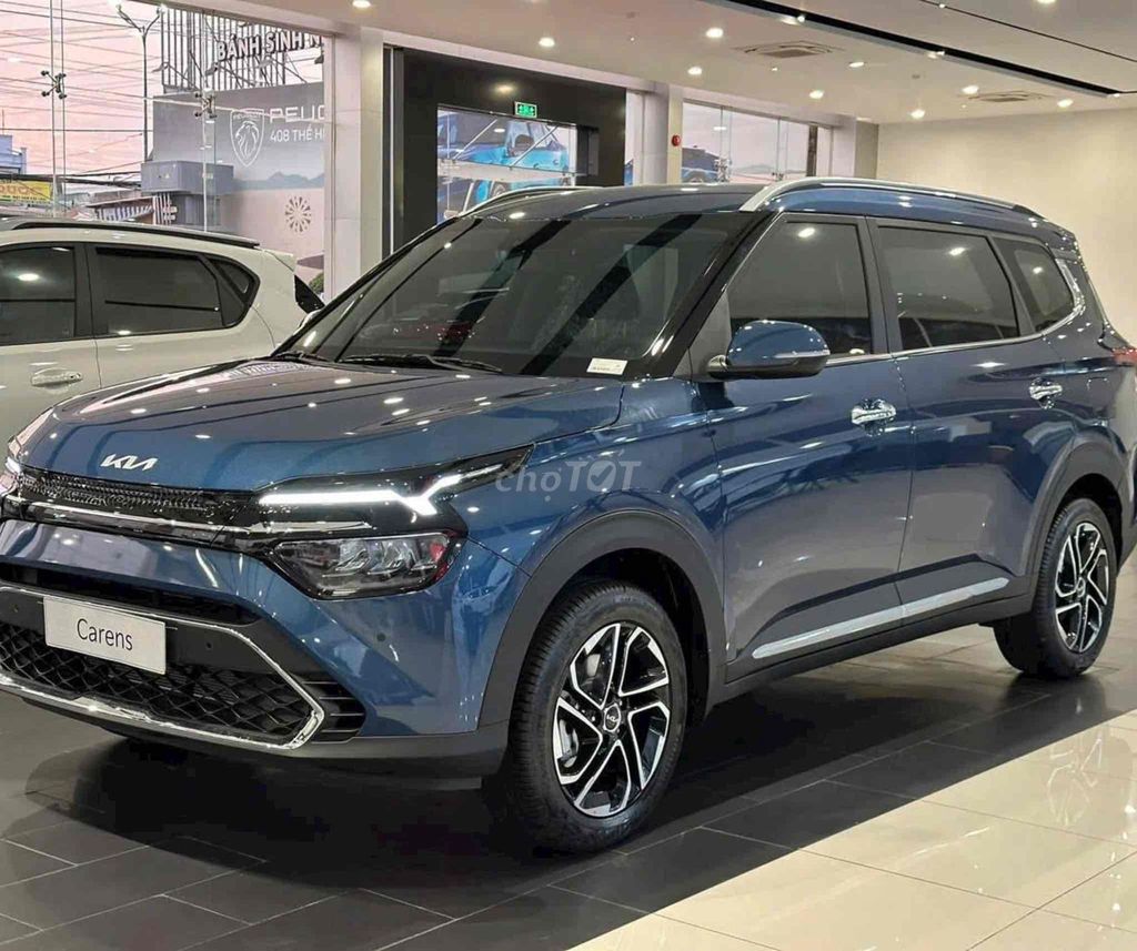 Kia Carens - ảnh 4