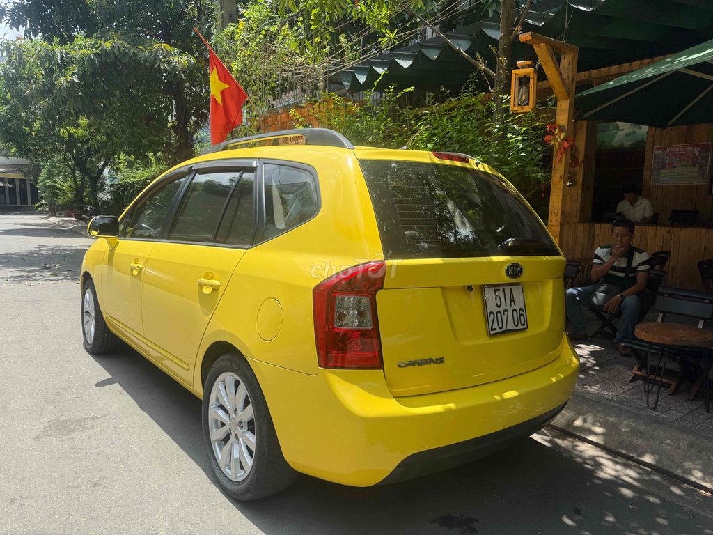 Kia Carens - ảnh 3
