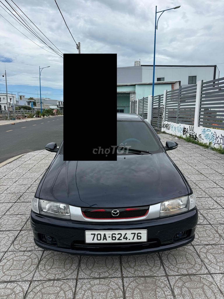 Mazda 323 2000 - ảnh 1