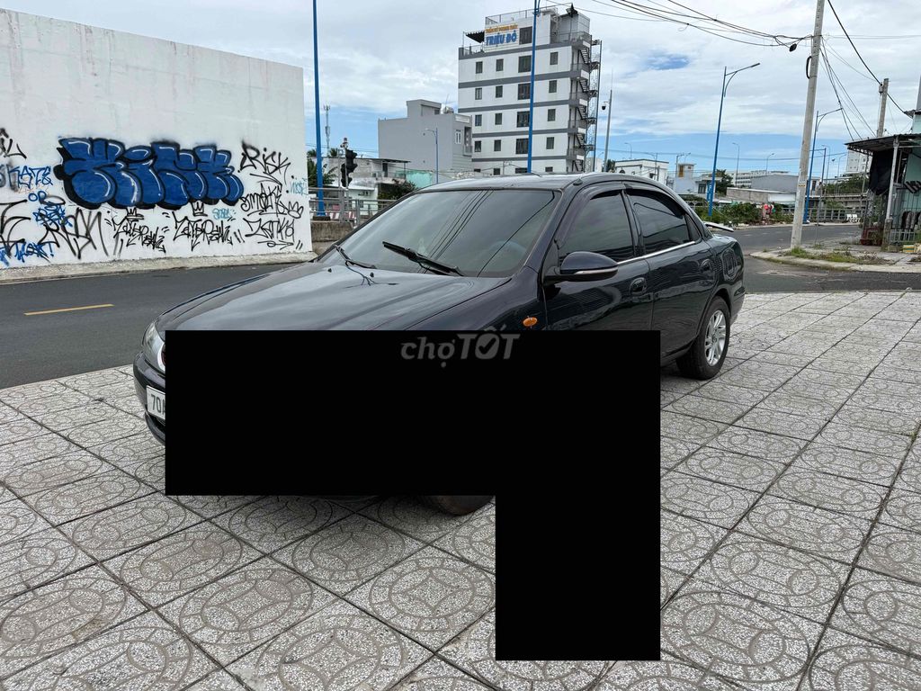 Mazda 323 2000 - ảnh 2