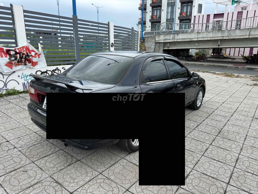 Mazda 323 2000 - ảnh 4