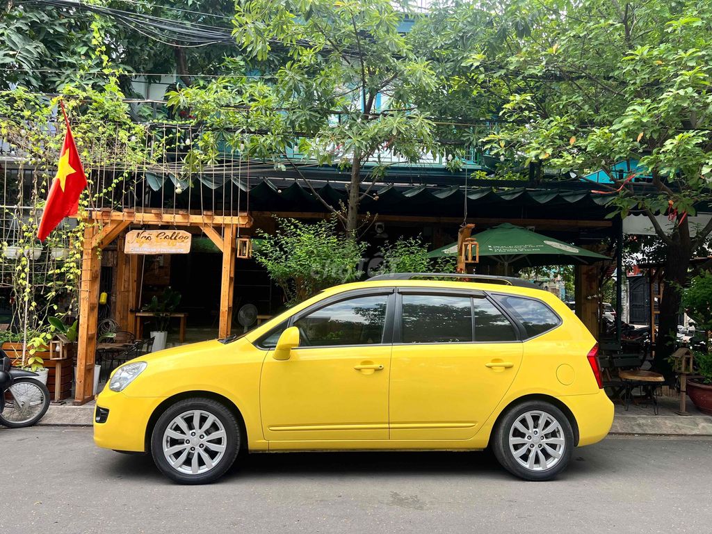 Kia Carens - ảnh 4