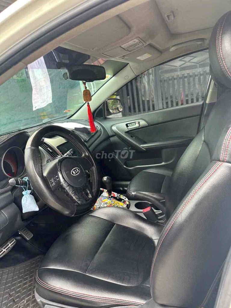 Kia Cerato 2009 - ảnh 4