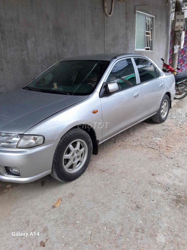 Mazda 323 2000 - ảnh 2