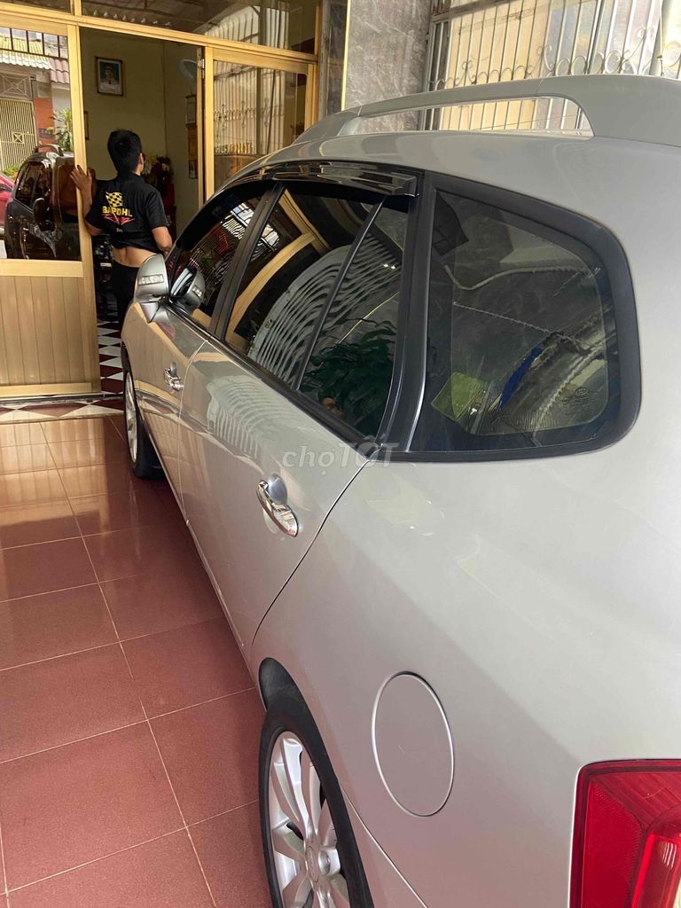 Kia Carens 2011 - ảnh 2