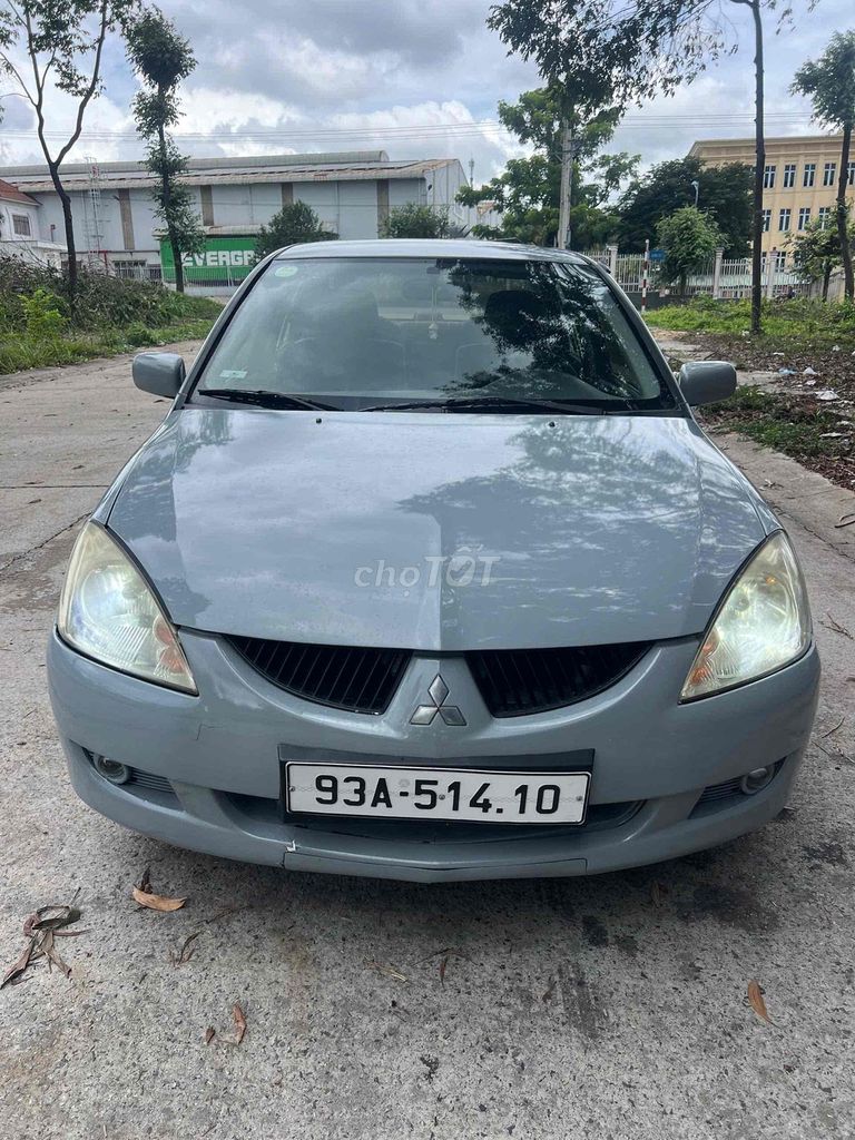 Mitsubishi Lancer - ảnh 1