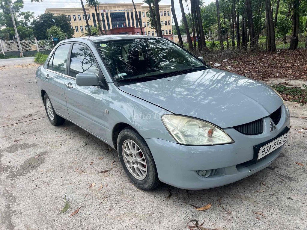 Mitsubishi Lancer - ảnh 5