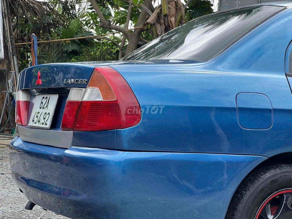 Mitsubishi Lancer 2001 - ảnh 3