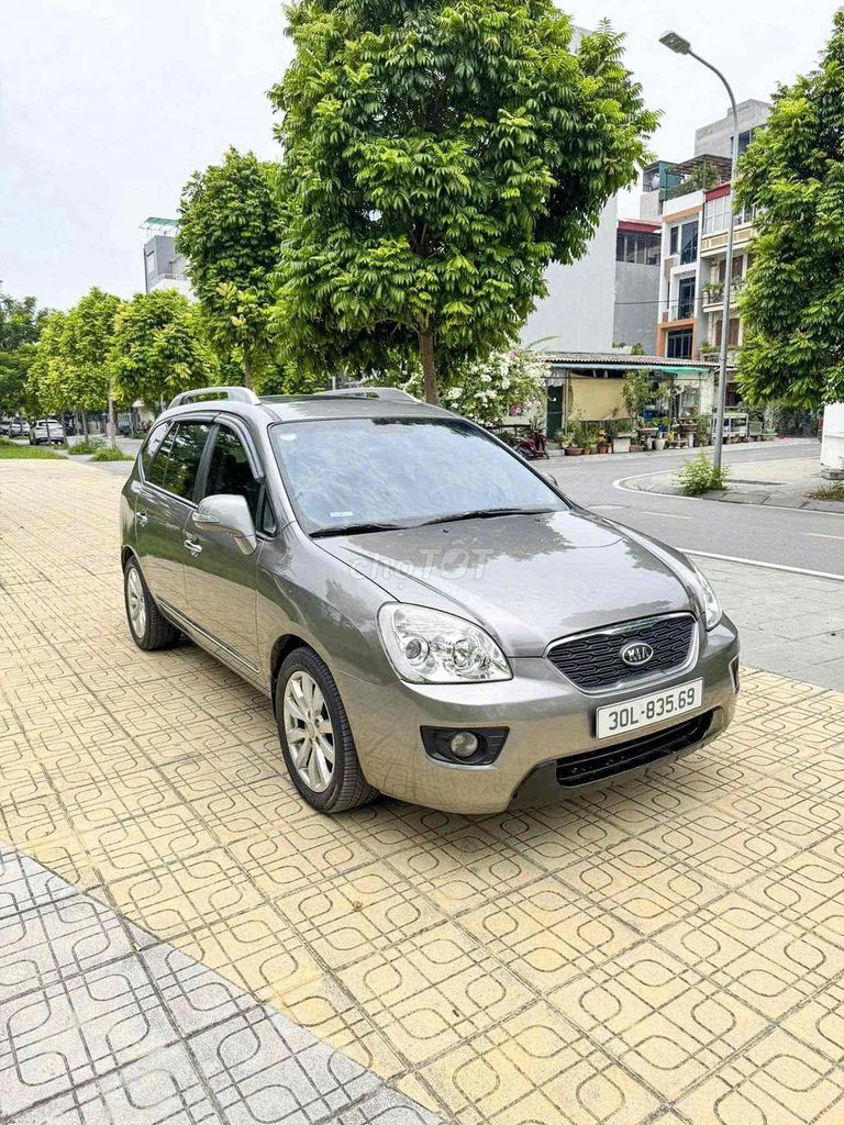 Kia Carens 2011 - ảnh 2