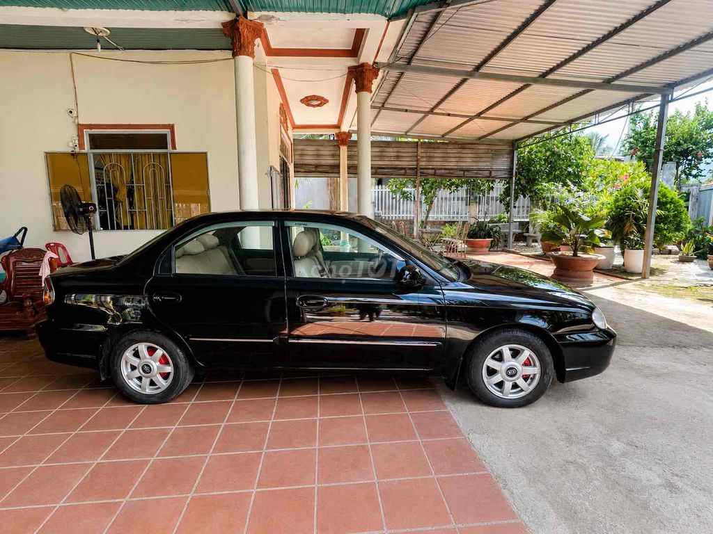 Kia Spectra 2005 - ảnh 2