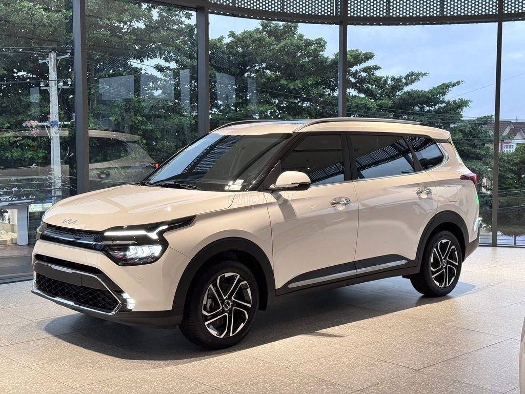 Kia Carens - ảnh 1