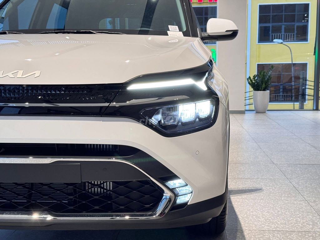 Kia Carens - ảnh 2