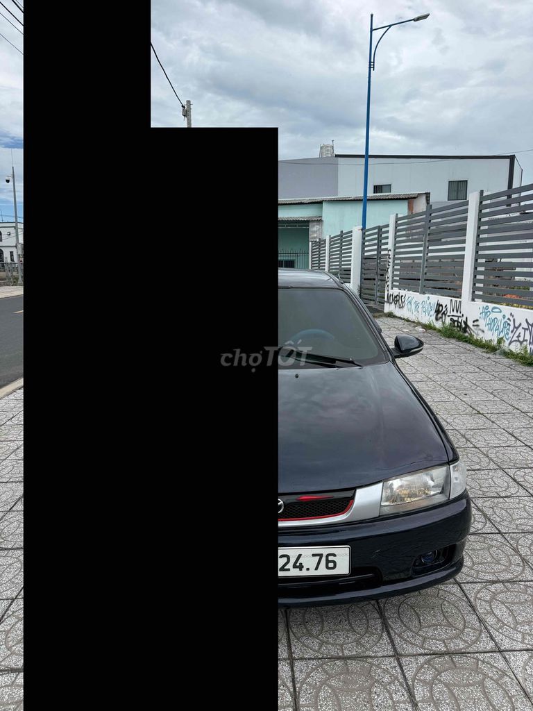 Mazda 323 2000 - ảnh 1