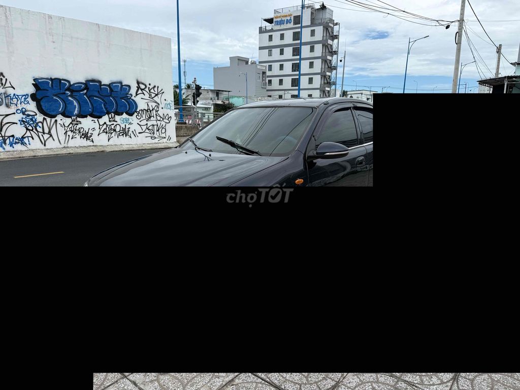 Mazda 323 2000 - ảnh 2