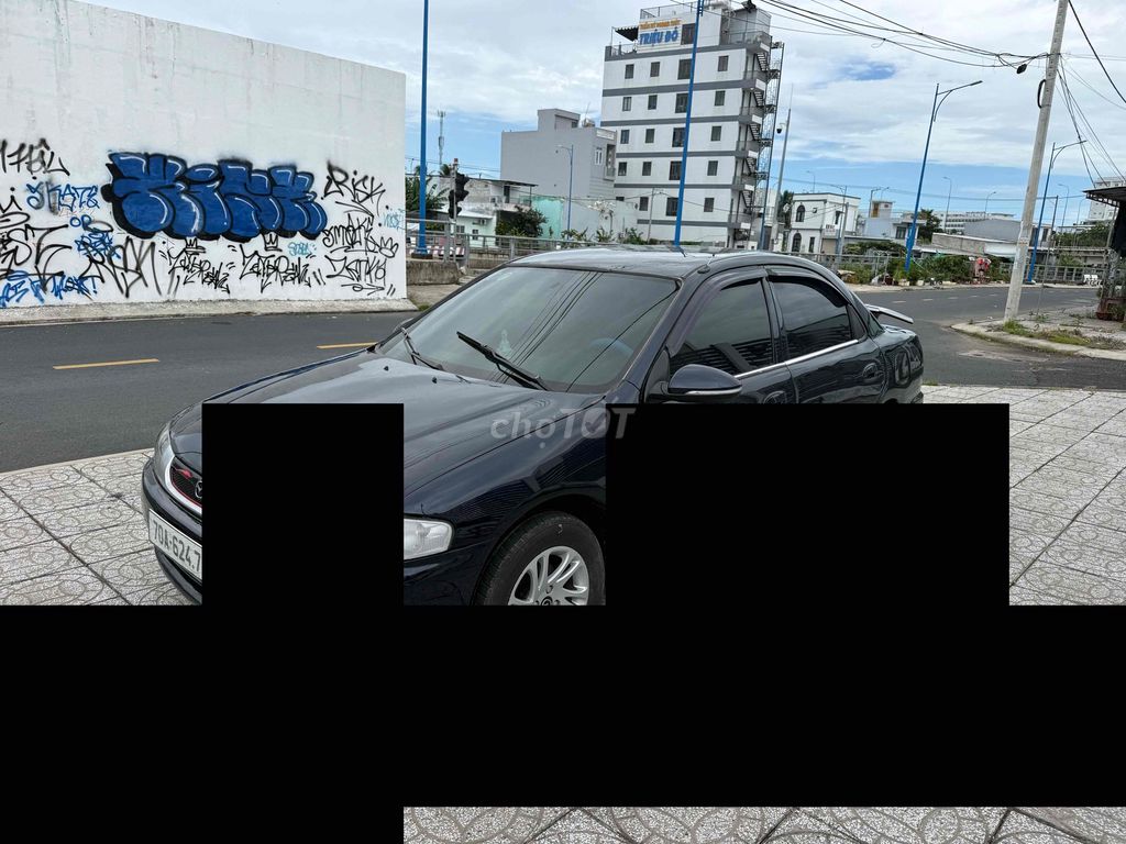 Mazda 323 2000 - ảnh 3