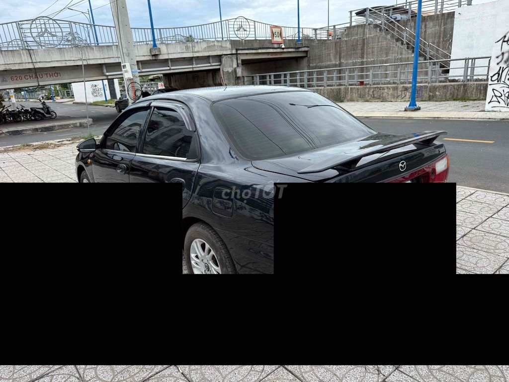 Mazda 323 2000 - ảnh 4