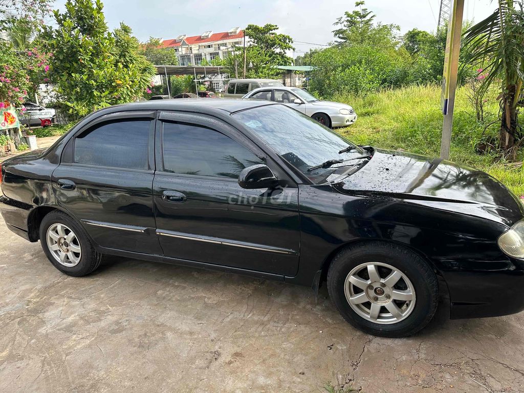 Kia Spectra 2005 - ảnh 5