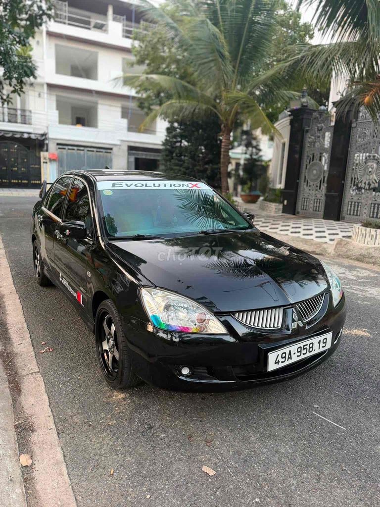 Mitsubishi Lancer 2004 - ảnh 2