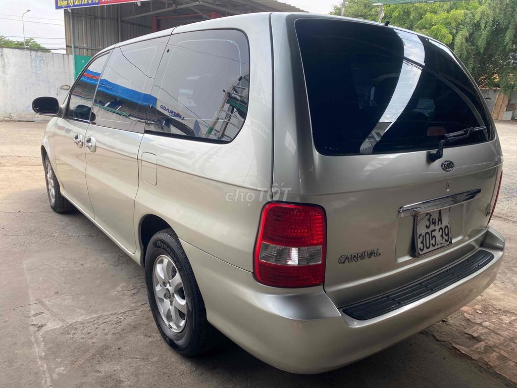 Kia Carnival 2009 - ảnh 4