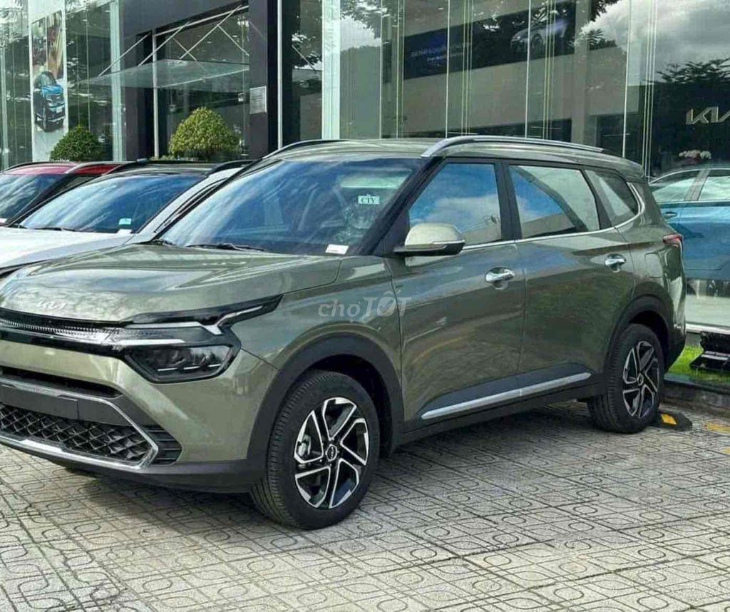 Kia Carens - ảnh 2