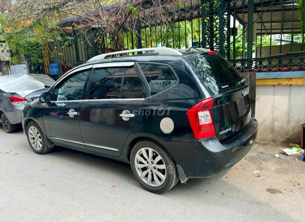 Kia Carens - ảnh 2