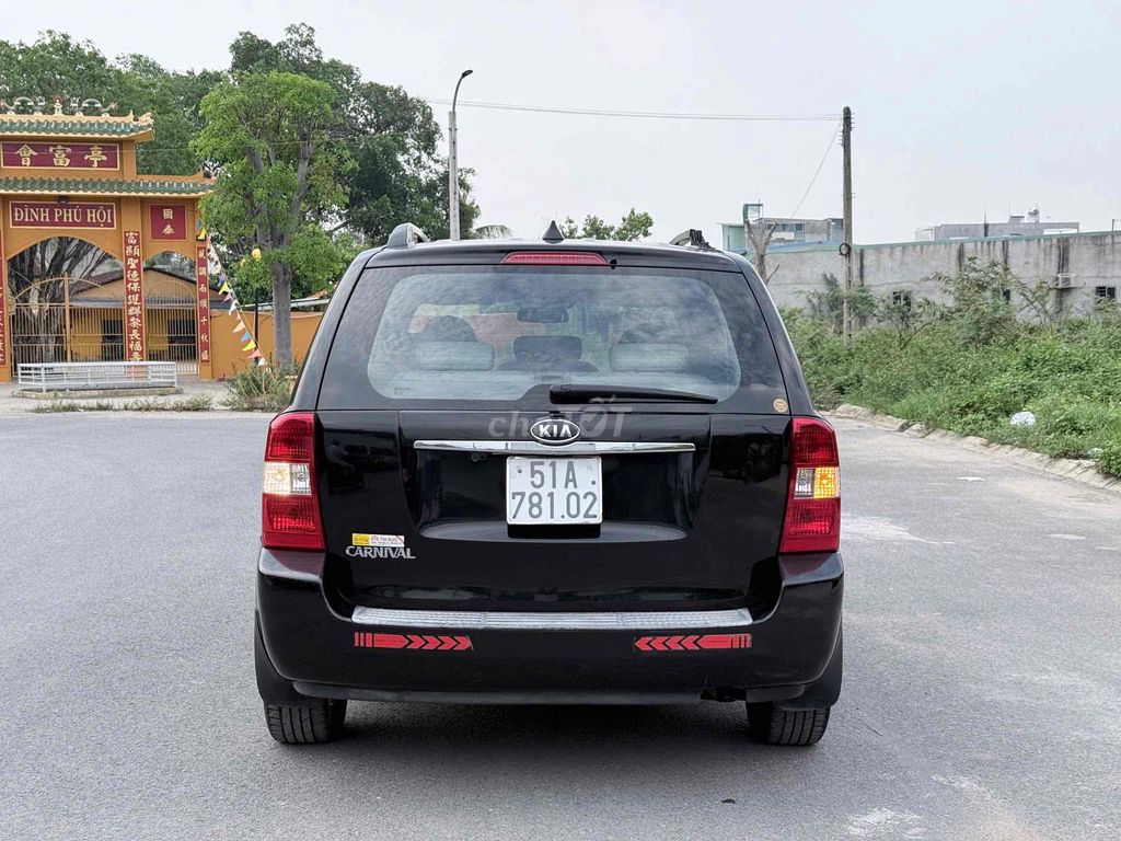 Kia Carnival 2010 - ảnh 4