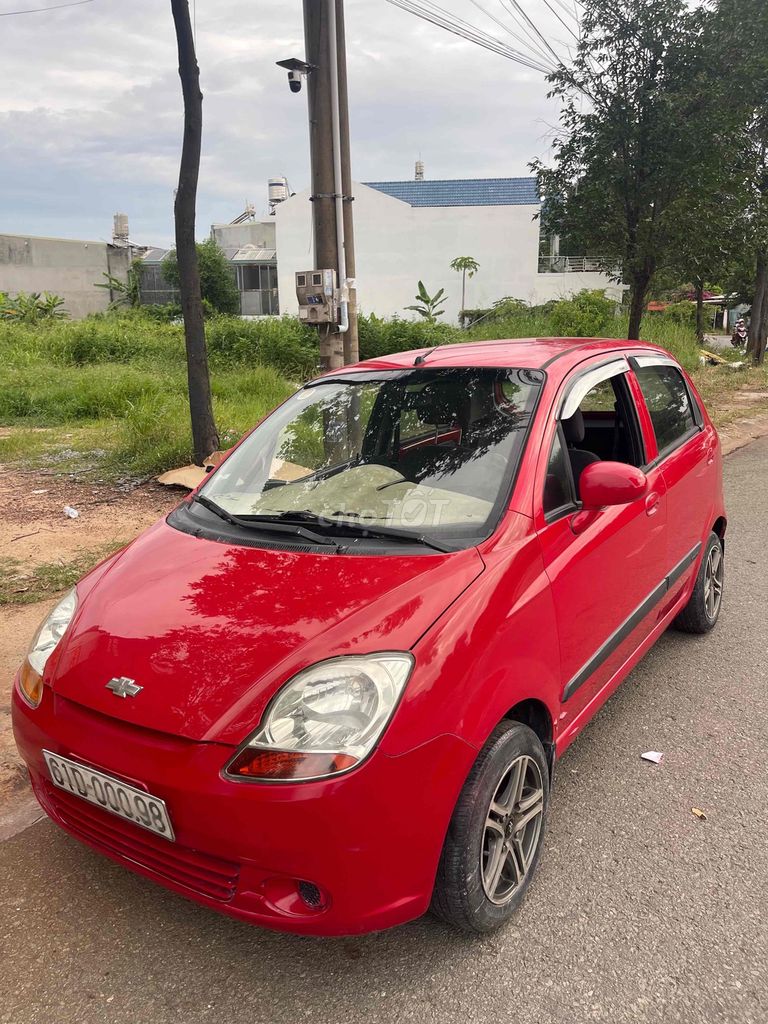 Chevrolet Spark 2011 - ảnh 1