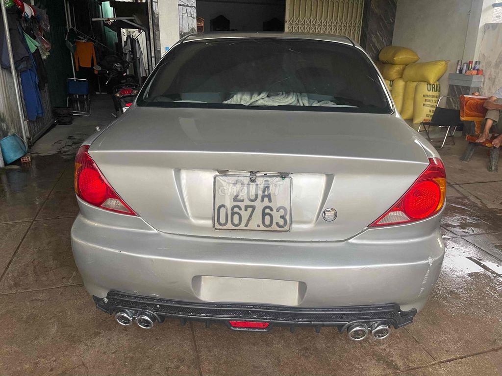 Kia Spectra 2004 - ảnh 4