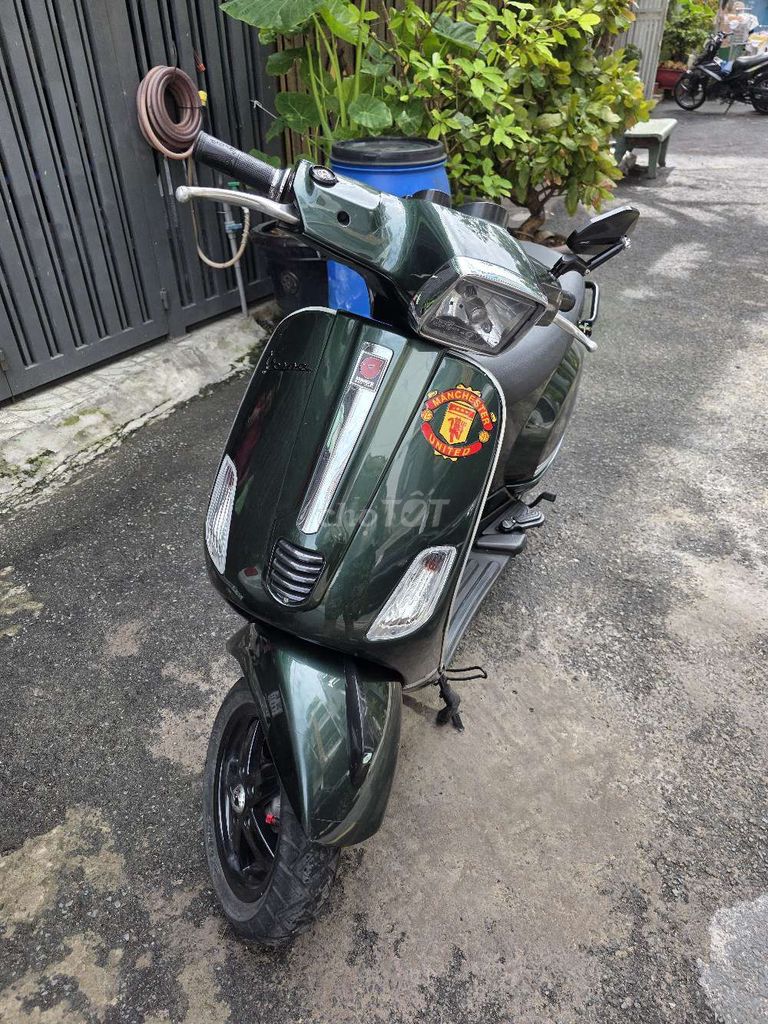 Vespa xanh 2009 - ảnh 1