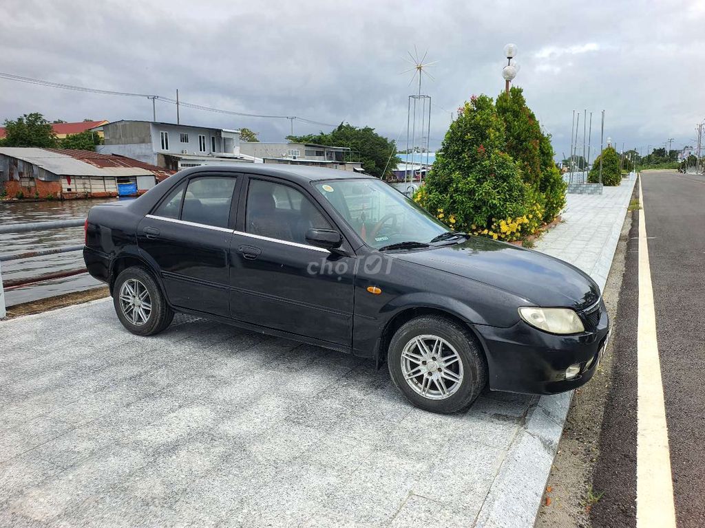 Mazda 323 - ảnh 2