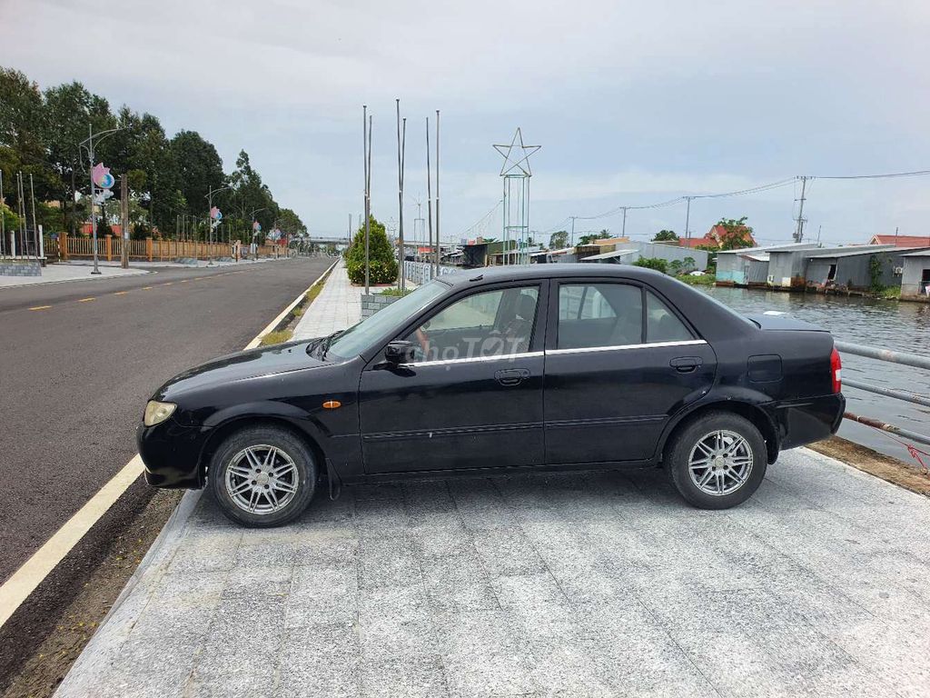 Mazda 323 - ảnh 4