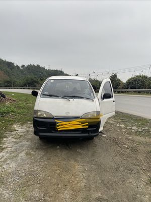 Daihatsu 2004 - ảnh 1