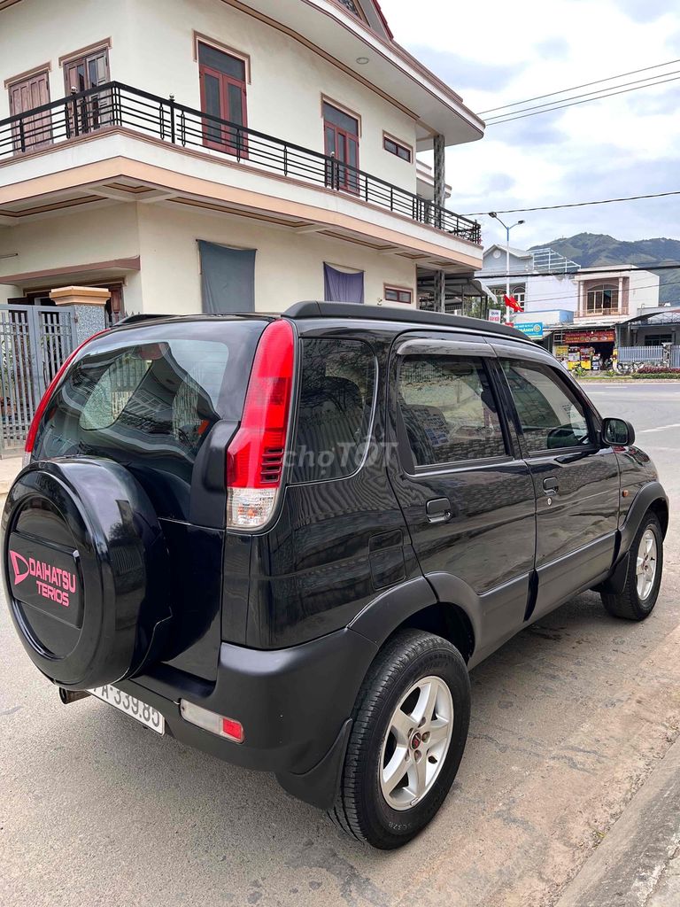 Daihatsu 2005 - ảnh 3