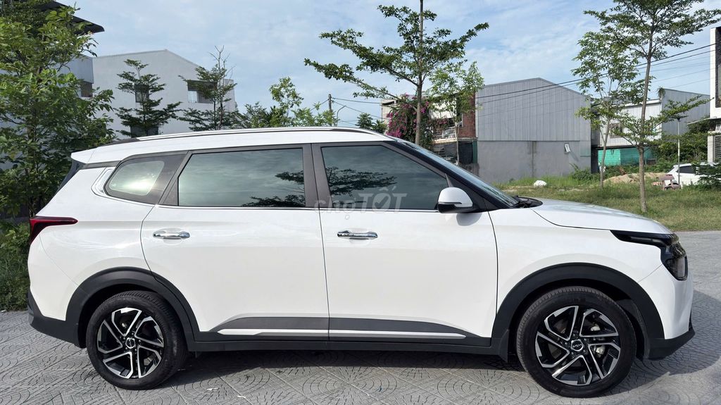 Kia Carens - ảnh 3