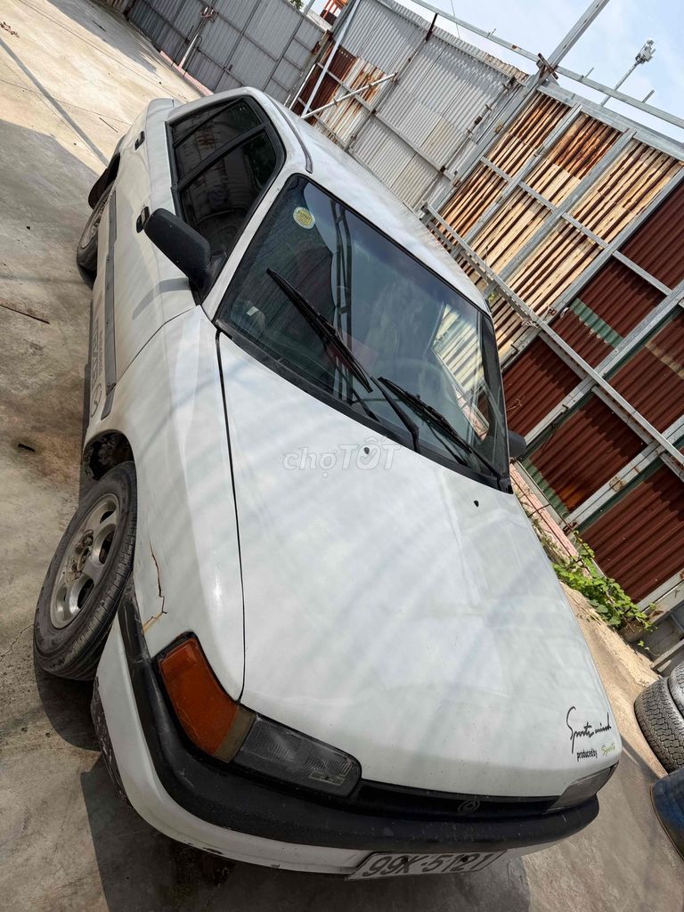 Mazda 323 1997 - ảnh 1